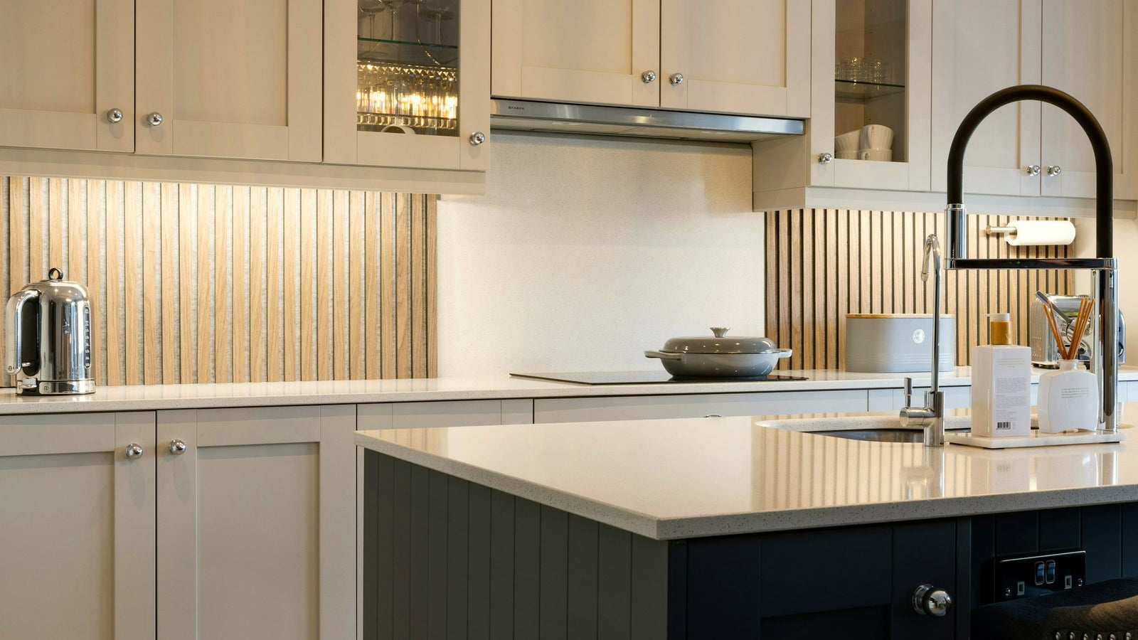 Cream and navy luxury kitchen with brass fixtures