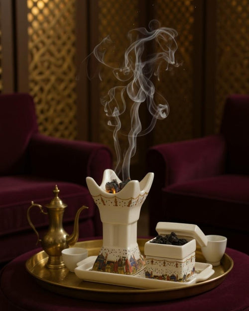 ZYVORA Mabkhara — at home in the maghrib hour. Mashrabiya screen, plum velvet, brass tray, smoke threading through the room.
