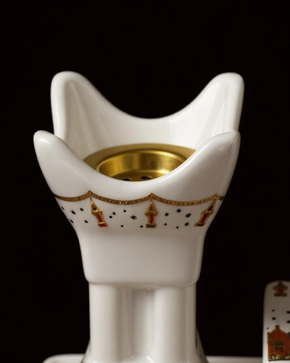 ZYVORA Mabkhara — brass charcoal cradle and ceramic glaze, in detail.