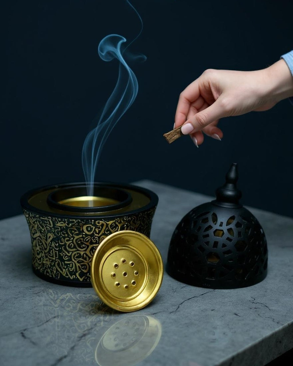ZYVORA Noor — placing bakhoor onto the brass tray, cool ambient minimalism.